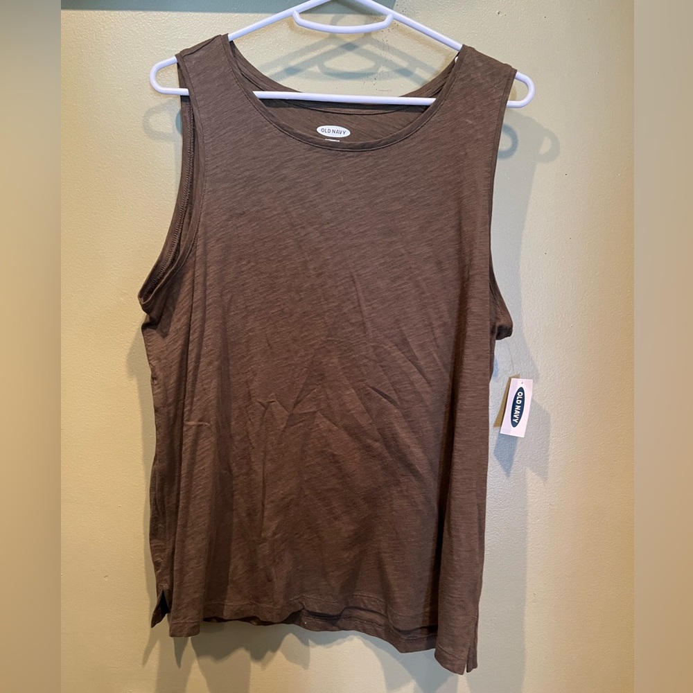Olive green tank top size medium in woman’s . Brand new with tag